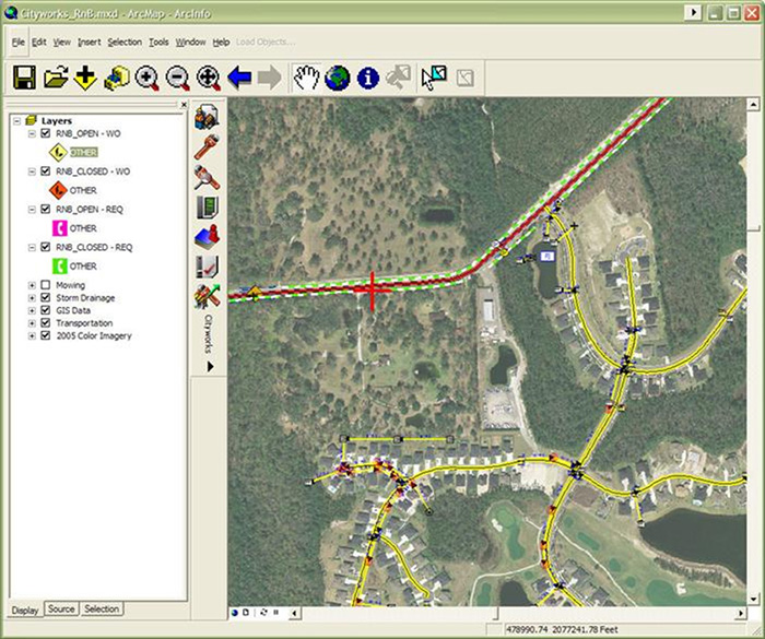 Screenshot from the St. John's County Maintenance Management System which shows a closeup satellite photograph of an area with its transportation assets highlighted in various colors