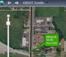 Screenshot from ODOT's FACS-STIP Tool, showing a closeup satellite image of the area surrounding a section of roadway. A green info window overlay points to, and is labeled with information about, a highway milepost.