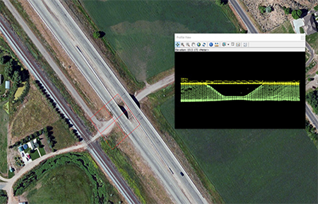 screenshot of a LiDAR image of a bridge on top of an aerial photo of the bridge