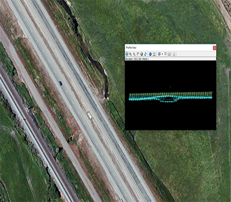 screenshot of a LiDAR image of a bridge on top of an aerial photo of the bridge