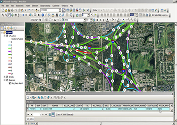 Screenshot of the LMI in ArcMap, showing an aerial photograph of intersecting highways which are colored and have data points on them