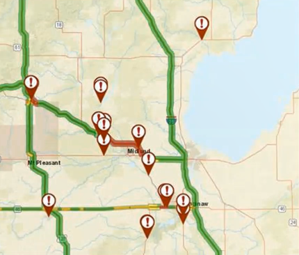 screenshot of MDOT’s dashboard displays a map of the area around Midland, Michigan marked to show locations of road closures