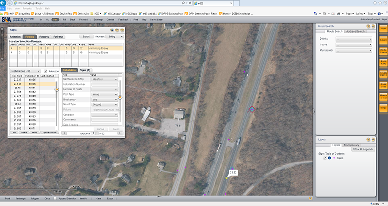 screenshot of the SHA Asset Data Management Warehouse showing a table of signs, a user interface, and a satellite photo marked to show the locations of signs