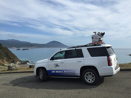 photo of a mobile LiDAR unit mounted on the top of an SUV